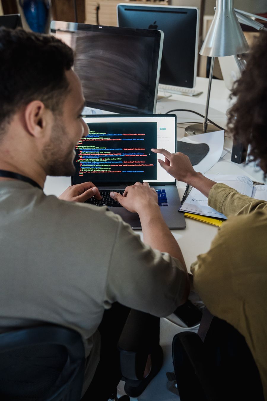 Bhavya IT Solution developers reviewing code together